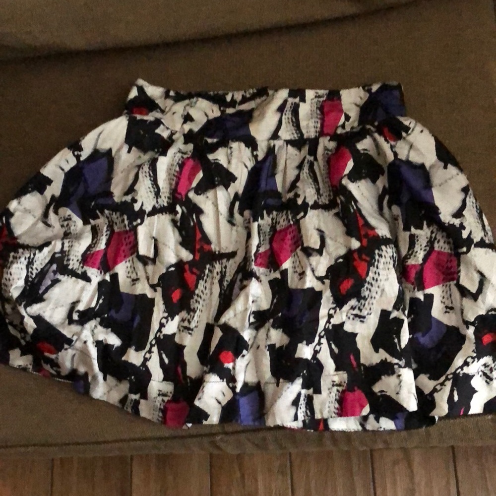 H&m divided black skirt with pockets size 12 invisible zipper and button